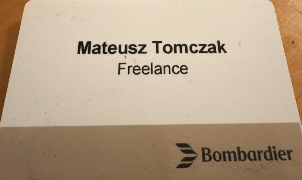 Name badge reading Mateusz Tomczak, Freelance, from the Bombardier Flight Attendant Safety Summit