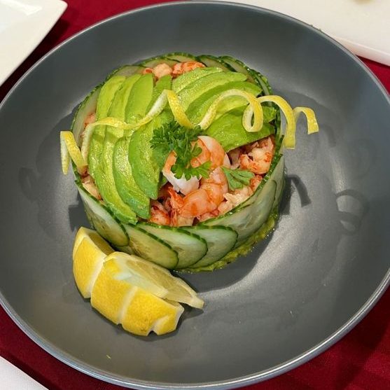 Prawn and avocado stack with cucumber and lemon